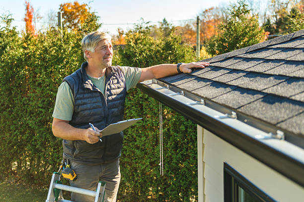 Professional Roofing technician working in Van Meter, IA